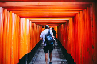 Tourist visiting shrine in Kyoto, Japan