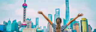 Women tourist amazed by the Shanghai skyline