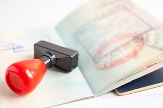 approved stamp on visa and passport document