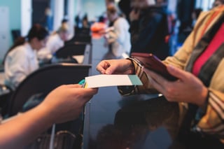 process of checking in on a conference congress