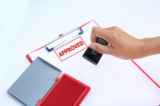 Hand Stamping Approved On Paper Sheet