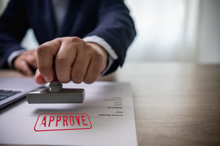 Man Stamping Approval