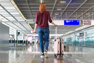 Woman Passenger With Luggage In International Airport Or Modern