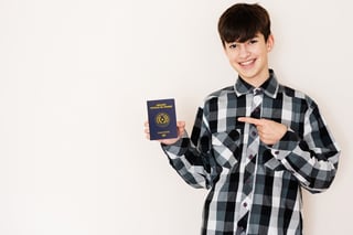 Young Teenager Boy Holding Paraguay Passport Looking Positive And Happy Standing