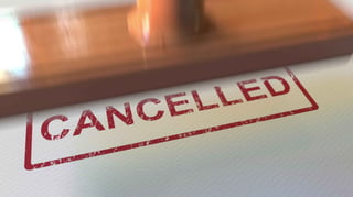Putting Cancelled Rubber Stamp On The Paper