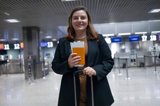Smiling Business Woman Going On Business Trip Carrying